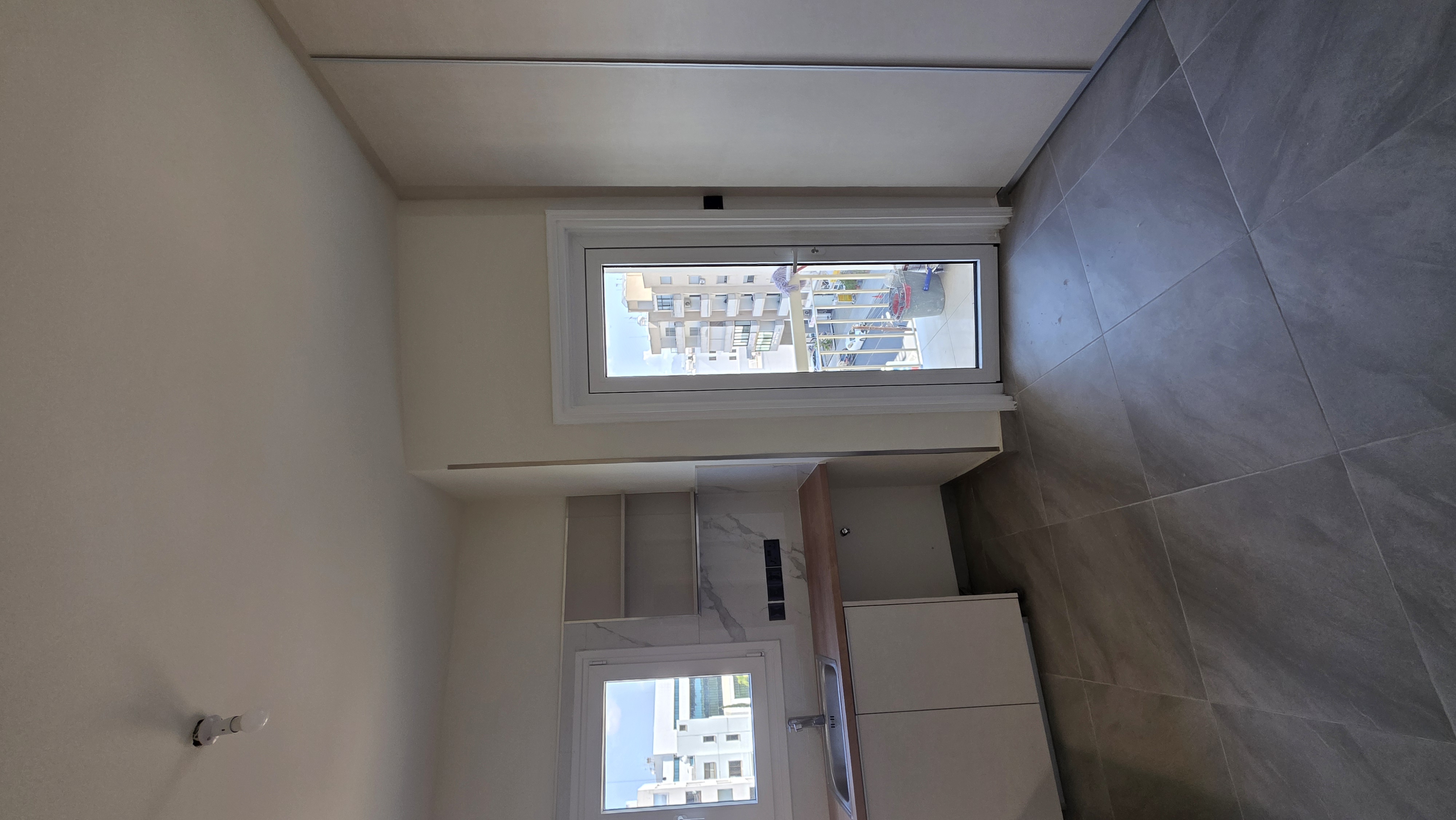 Luxuriously Renovated 3-Bedroom Penthouse in Prime Central Location, Agioi Omologites